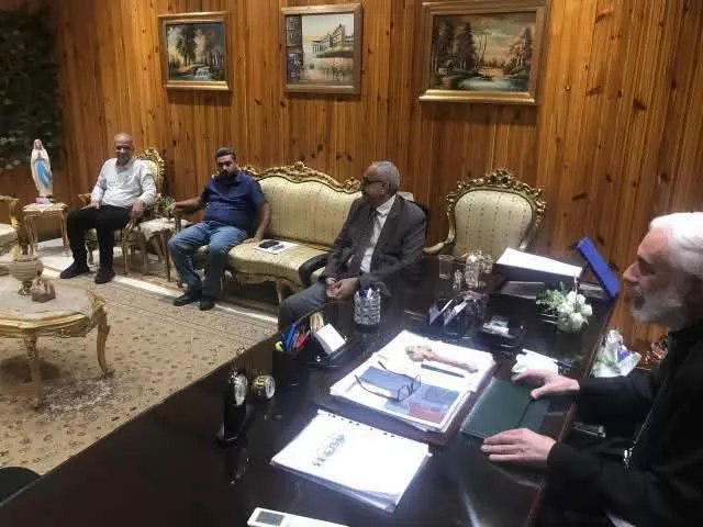 الأبنا باسيليوس فوزي وأعضاء جمعية الراعي الصالح بالمنيا