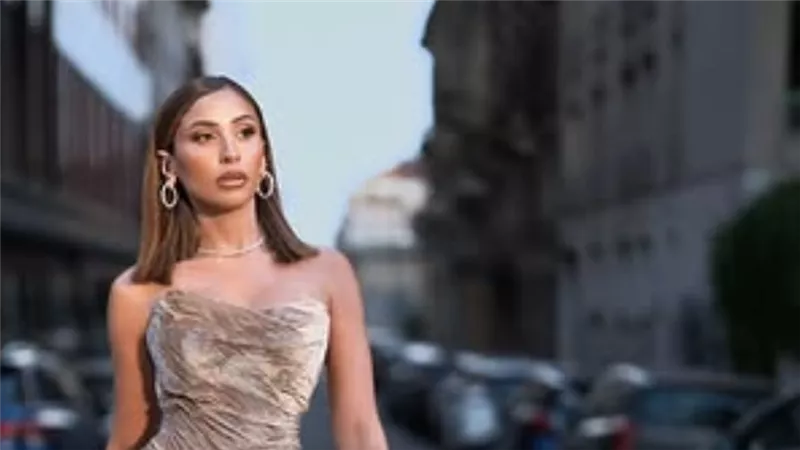 دينا الشربيني تطل بالأبيض الحريري